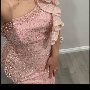 A blush color dress. Size 4-6! Only worn once!